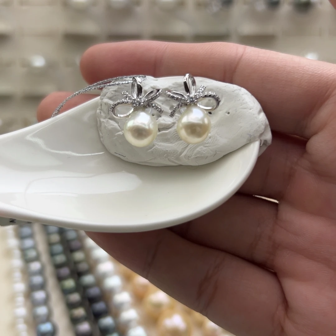 银S925镶嵌耳饰海水珍珠7-8mm海水Ak蝴蝶结耳钉