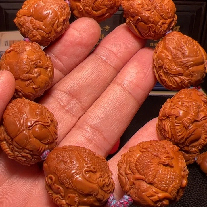 吉***龙橄榄核手串瑞兽八星报喜