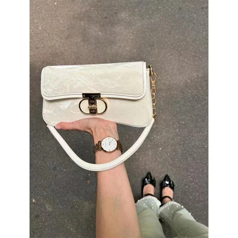 小众设计法棍轻奢腋下包2025新款法式高级感时尚百搭通勤单肩包女