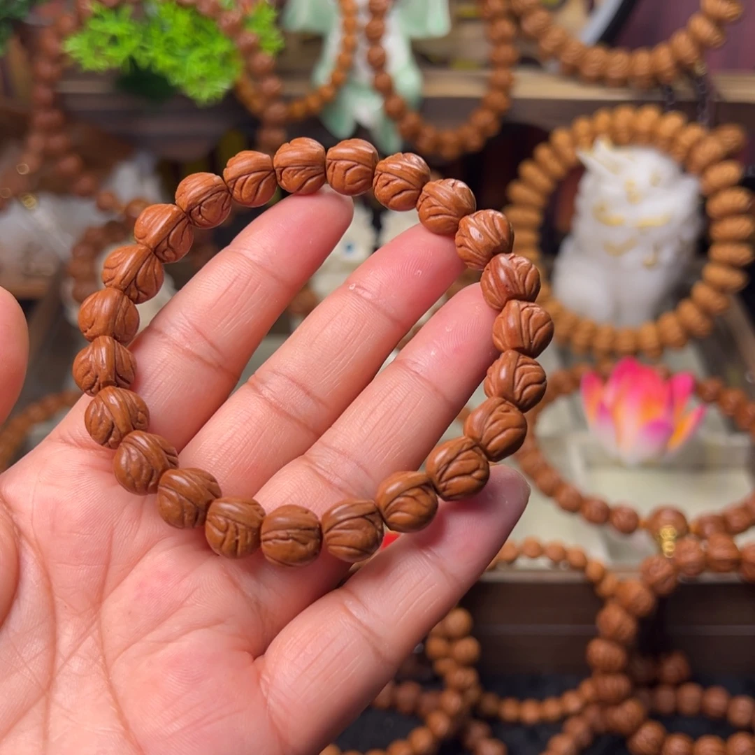 卓***正手串桃核玉龙脊手串11