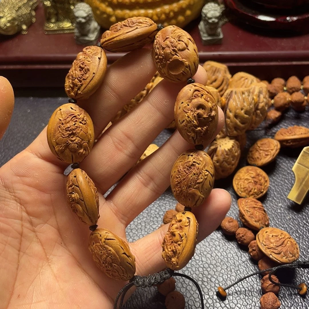 大桃核雕刻瑕疵龙生九子