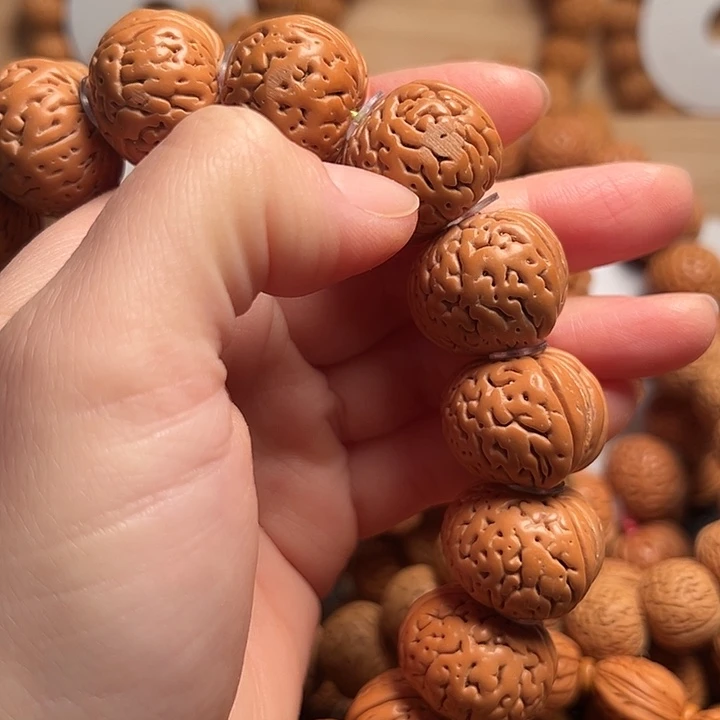 鼹***奕吊坠桃核桃核手持磨盘大开口22