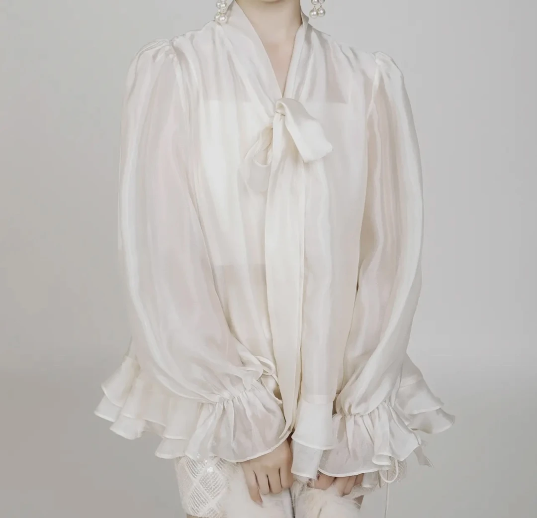 「HMM」荷叶边蝴蝶结轻盈上衣
