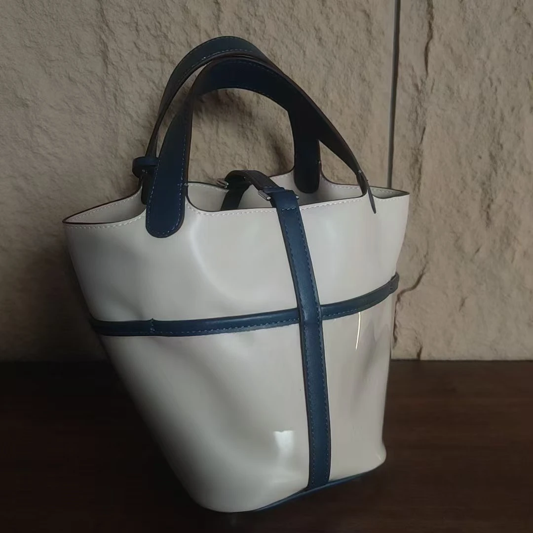 YNPO24年秋冬新款真皮重工女包小熊菜蓝白
