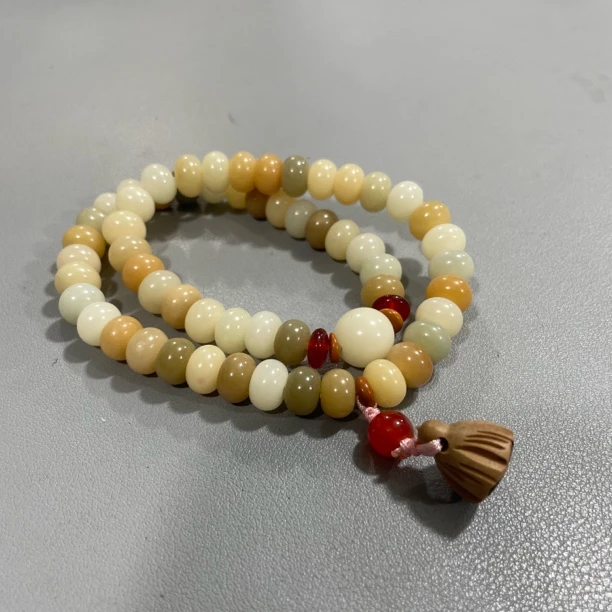 P934多宝菩提算盘珠卡0.9双圈手串