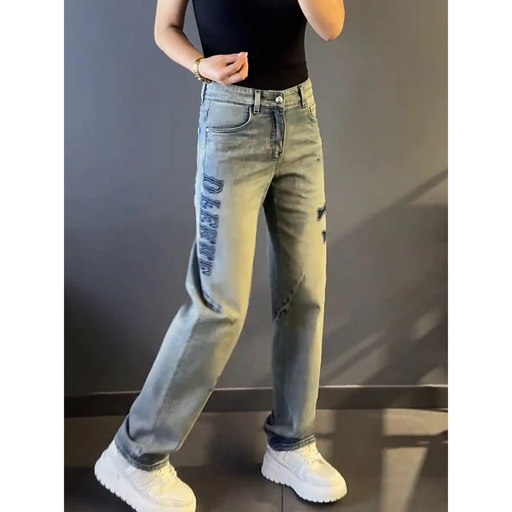 潮流休闲补丁修身小脚潮牌个性裤潮新款破洞贴布刺绣牛仔裤男士