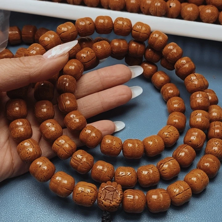 齐**圣桃核脖挂双珠13花皮色差66颗