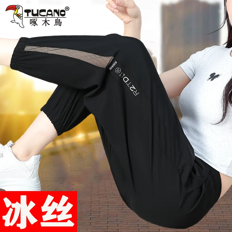 啄木鸟冰丝速干运动裤子女夏季2025新款时尚宽松百搭休闲裤九分裤