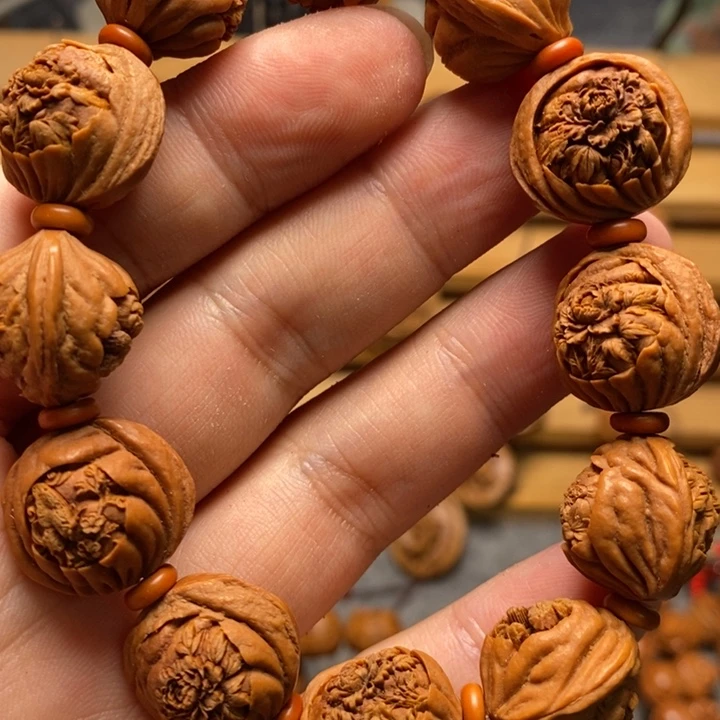 漂***心桃核雕刻花开富贵手串