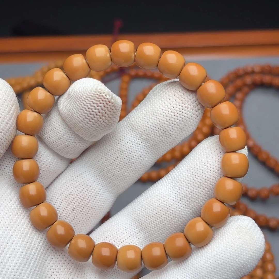 隋***灬吊坠橄榄核核尖单圈8.5