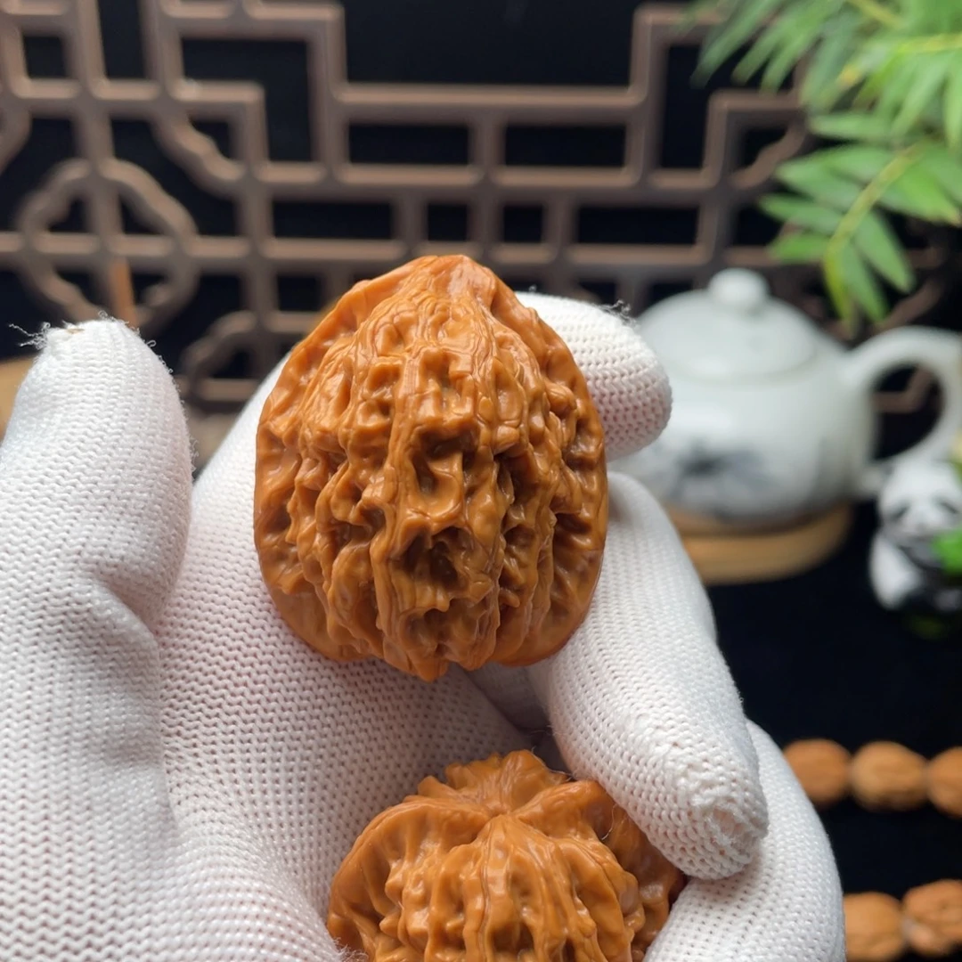 文玩核桃吊坠四眼虎头