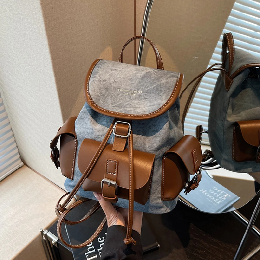 双肩包女大容量休闲百搭小众设计韩版上课书包水桶包轻便旅游背包