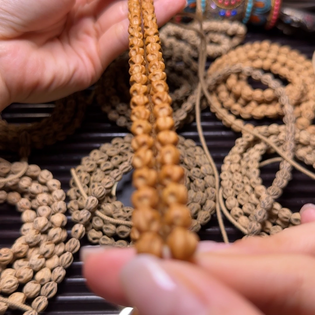 聂***跑吊坠柏香籽/百香籽