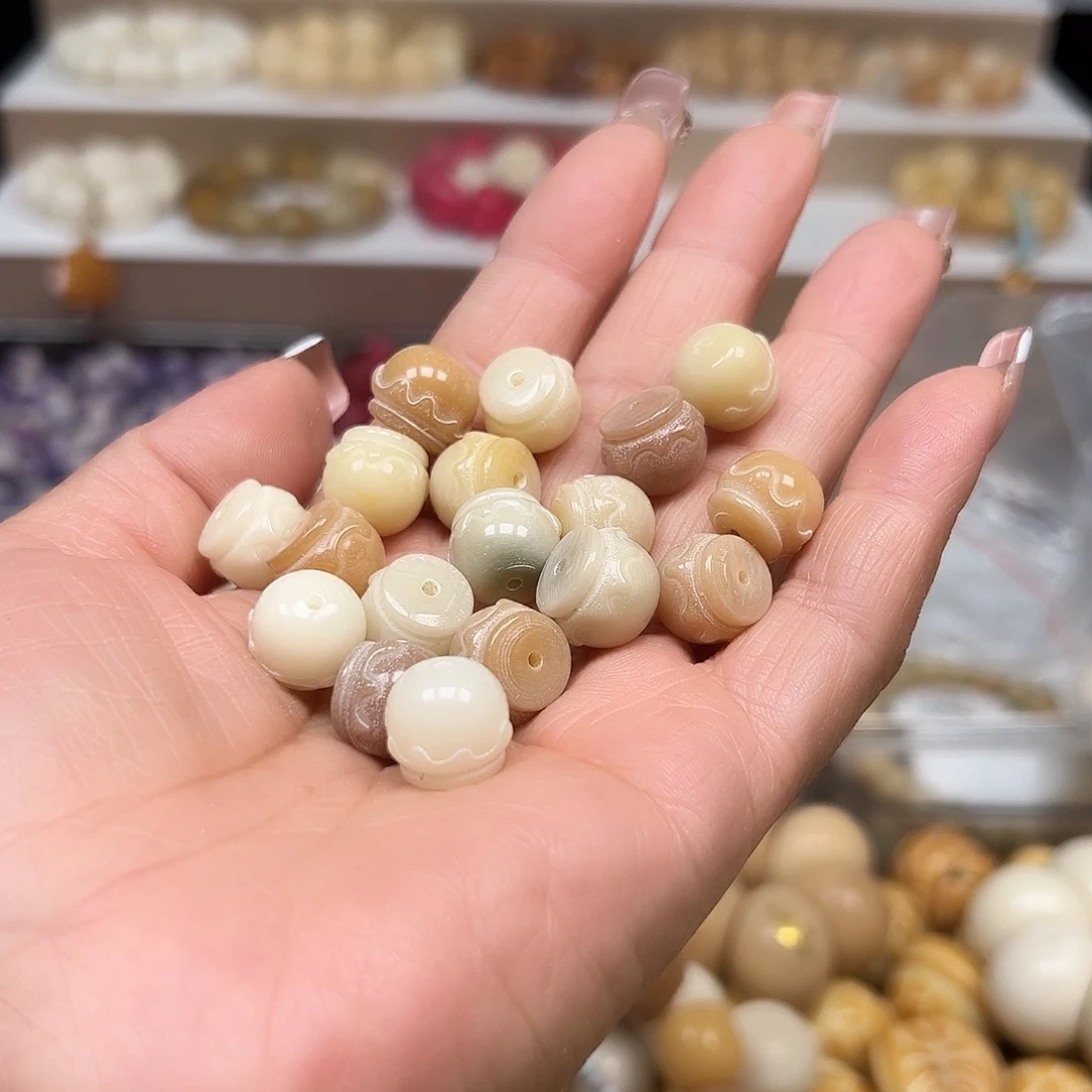 闽***湘手串菩提根/象牙果微瑕蜜罐50颗