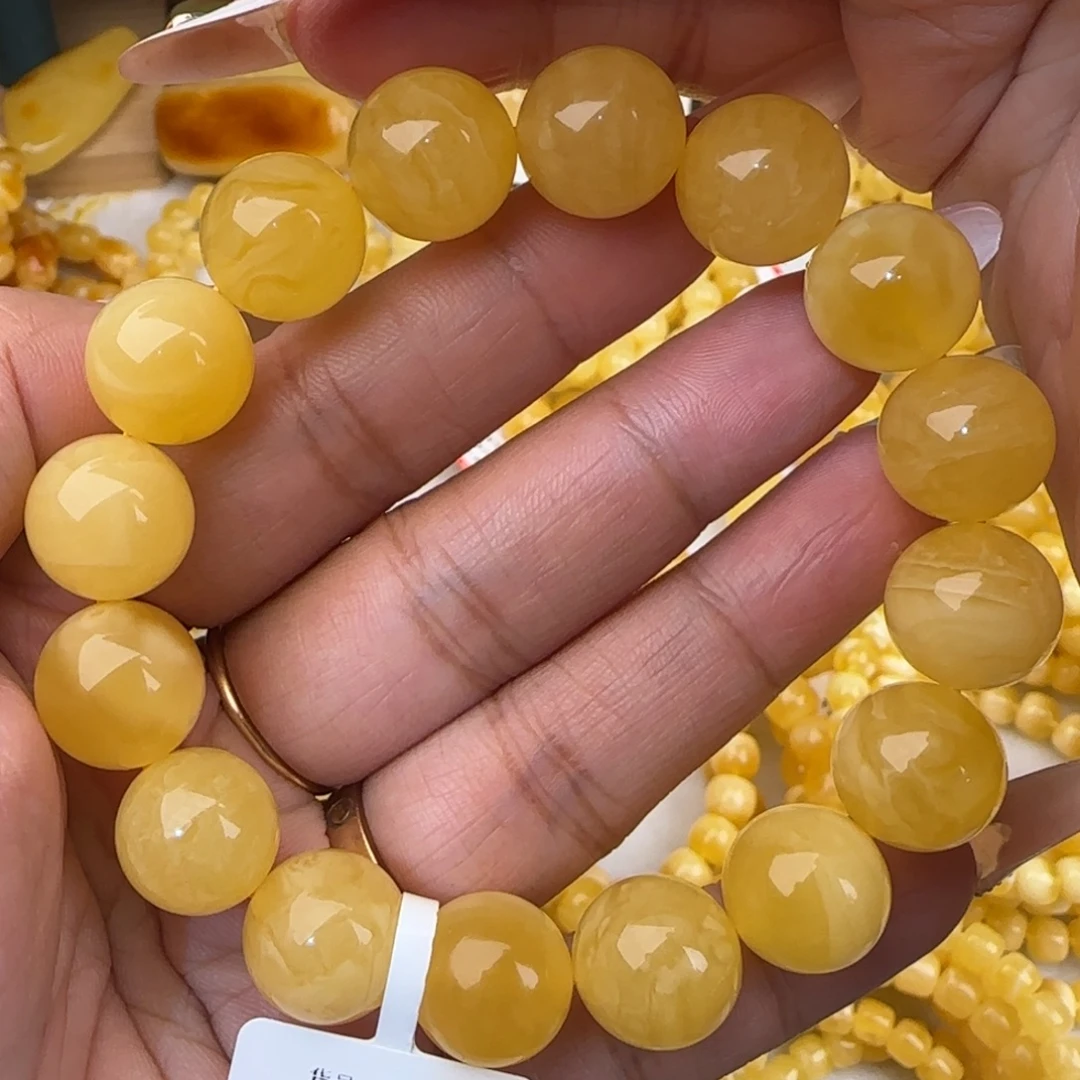 蜜蜡未镶嵌手串鸡油黄飘白花圆珠手串