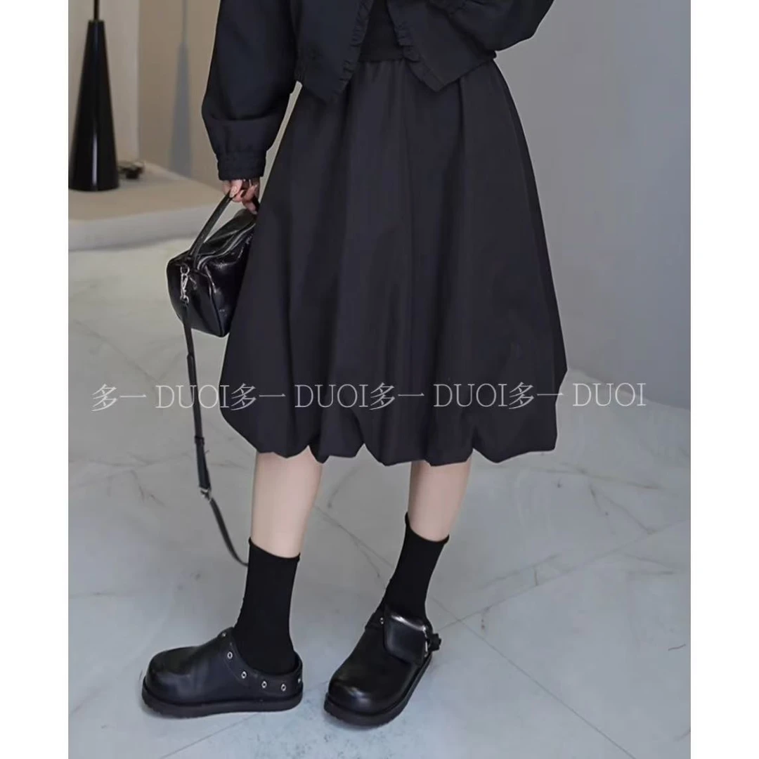 多一“春日芭蕾”2025早春休闲松紧腰中长款下摆花苞A字显瘦半身裙