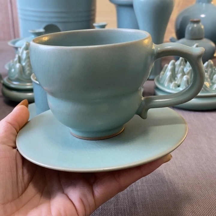 瓷片一杯一垫一一