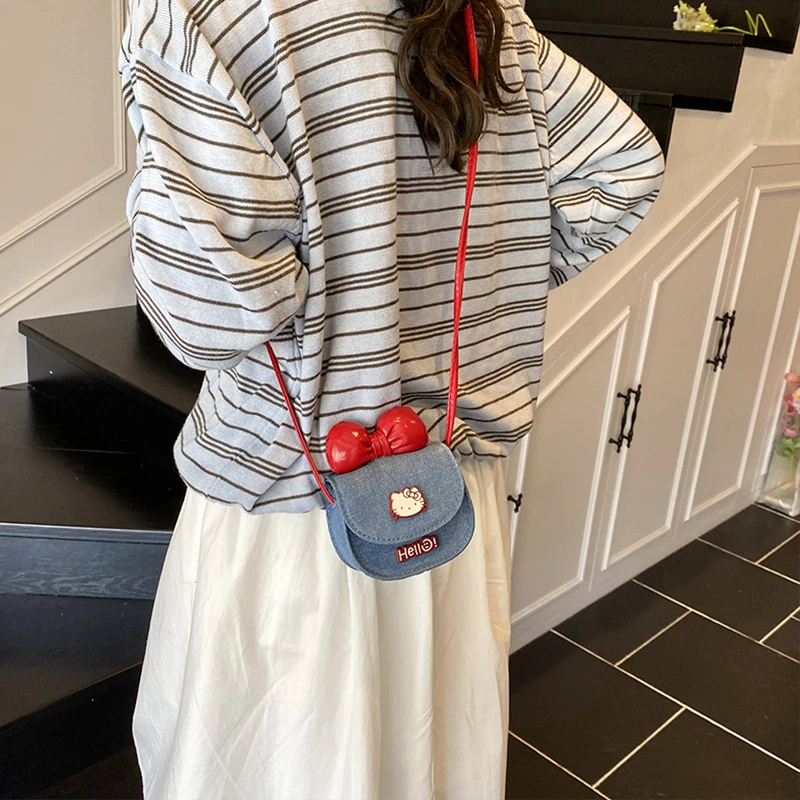 新款卡通可爱猫咪蝴蝶结零钱包洋气迷你斜挎包耳机包女可爱造型包