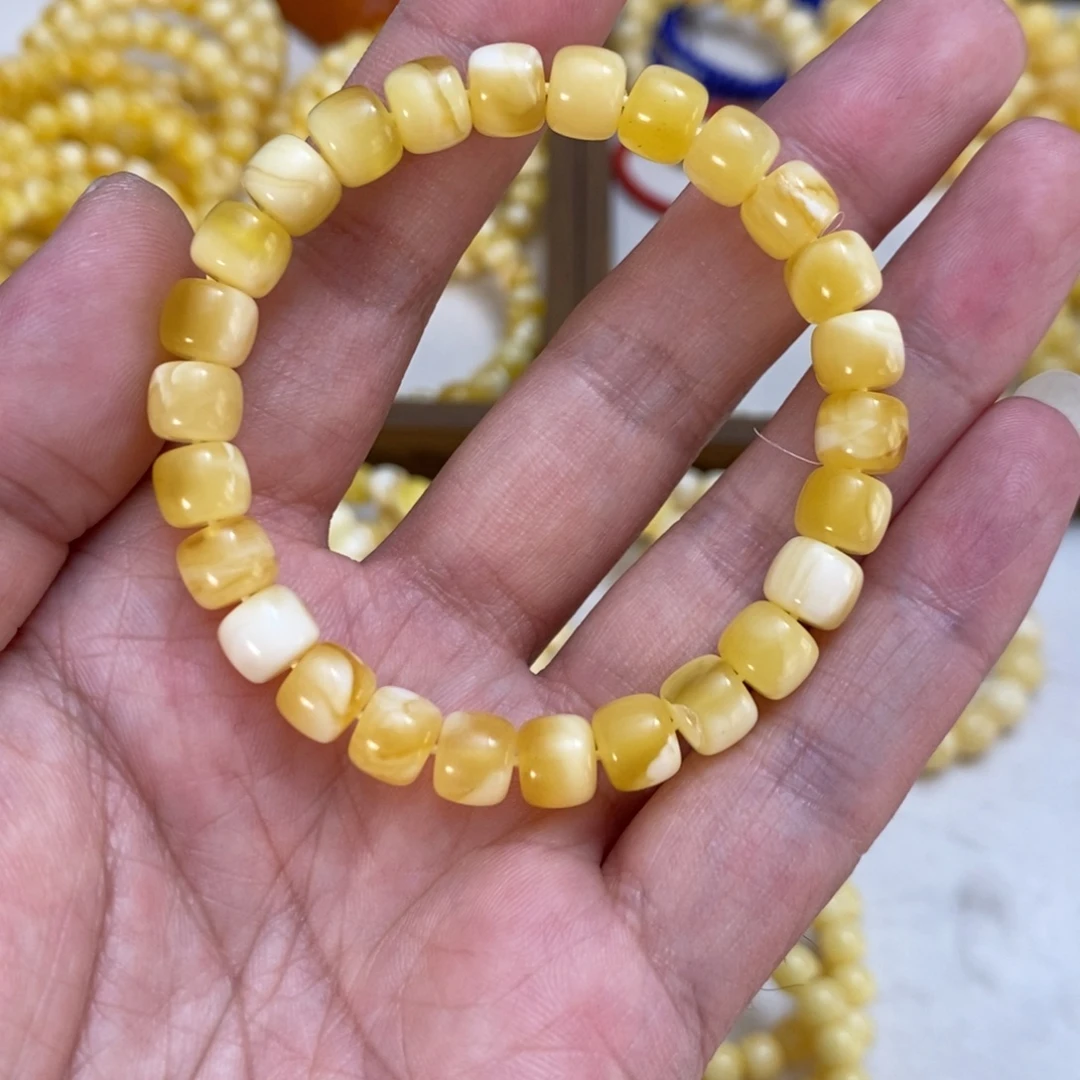 琥珀未镶嵌裸石8.5浮光黄白花