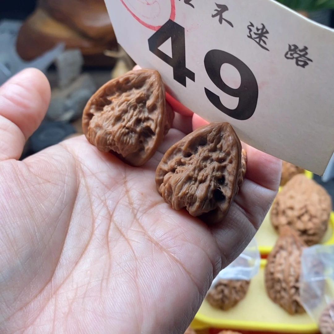 把件文玩核桃黑*根红狮子佛肚