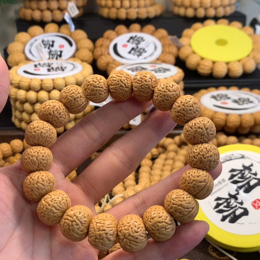 学***松精品桃核磨盘手串