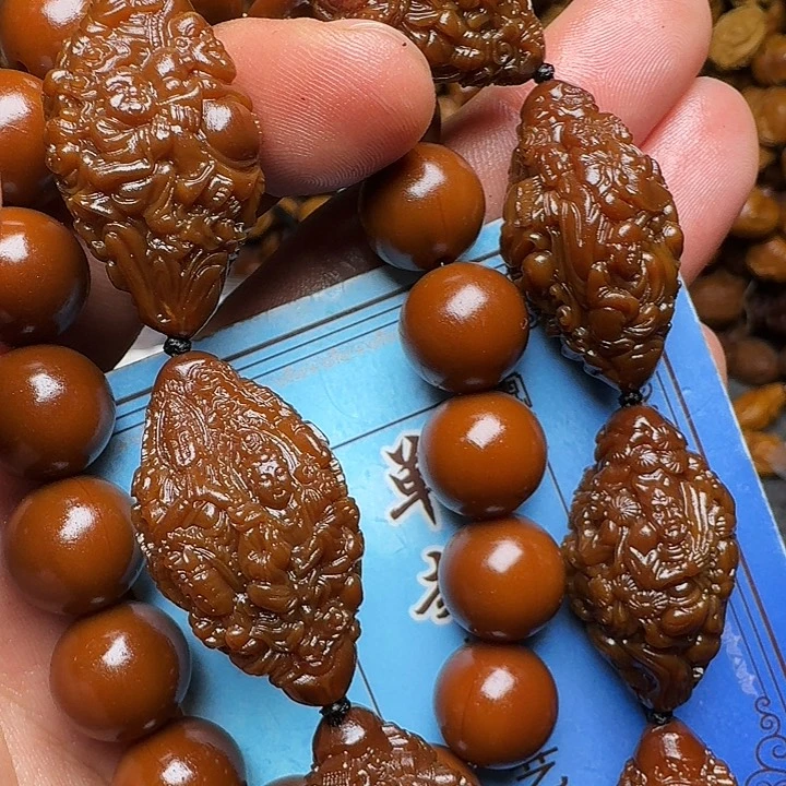 橄榄核吊坠你的电话