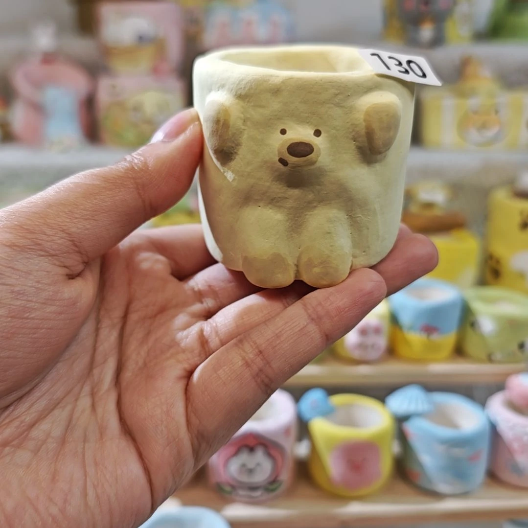 巧***_满29.9包邮手工花盆