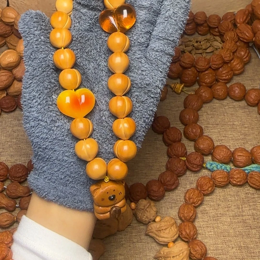 文玩核桃吊坠屁桃手持