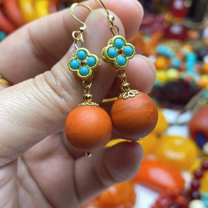树脂制品16号橘色耳坠