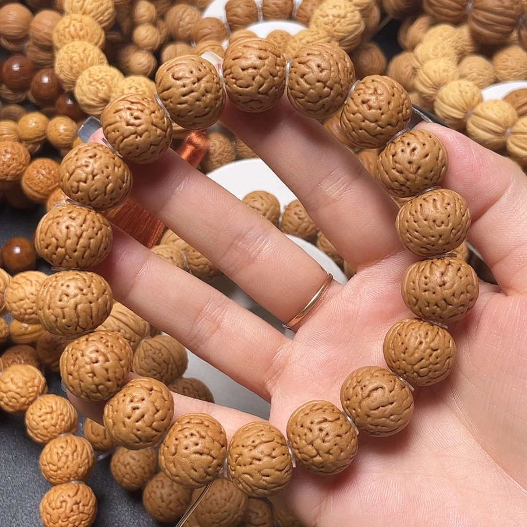 用***…桃核手串金丹手串