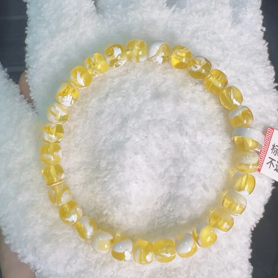 未镶嵌琥珀裸石7mm金漆白溶洞妖花