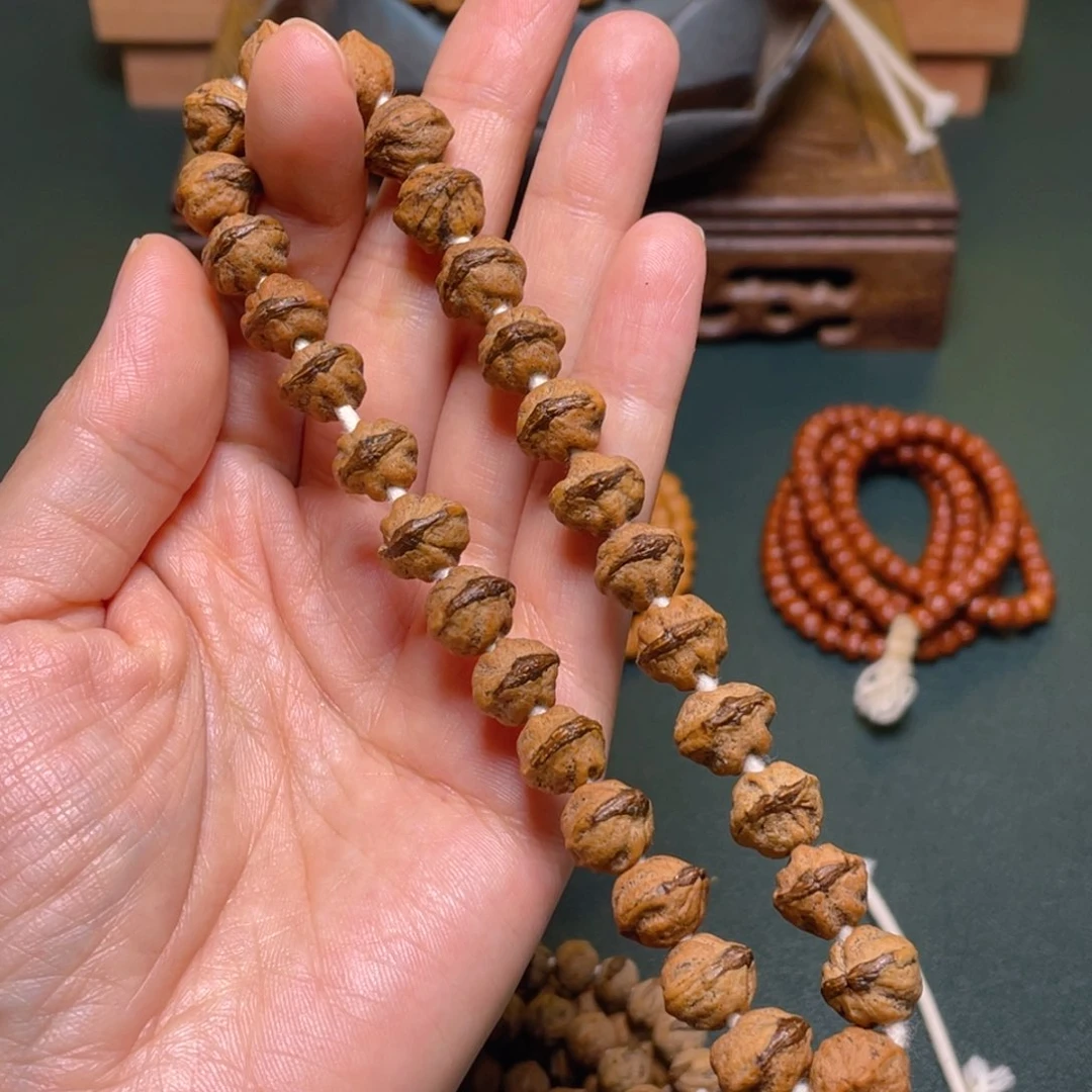 柏香籽/百香籽吊坠巨无霸红牙手持