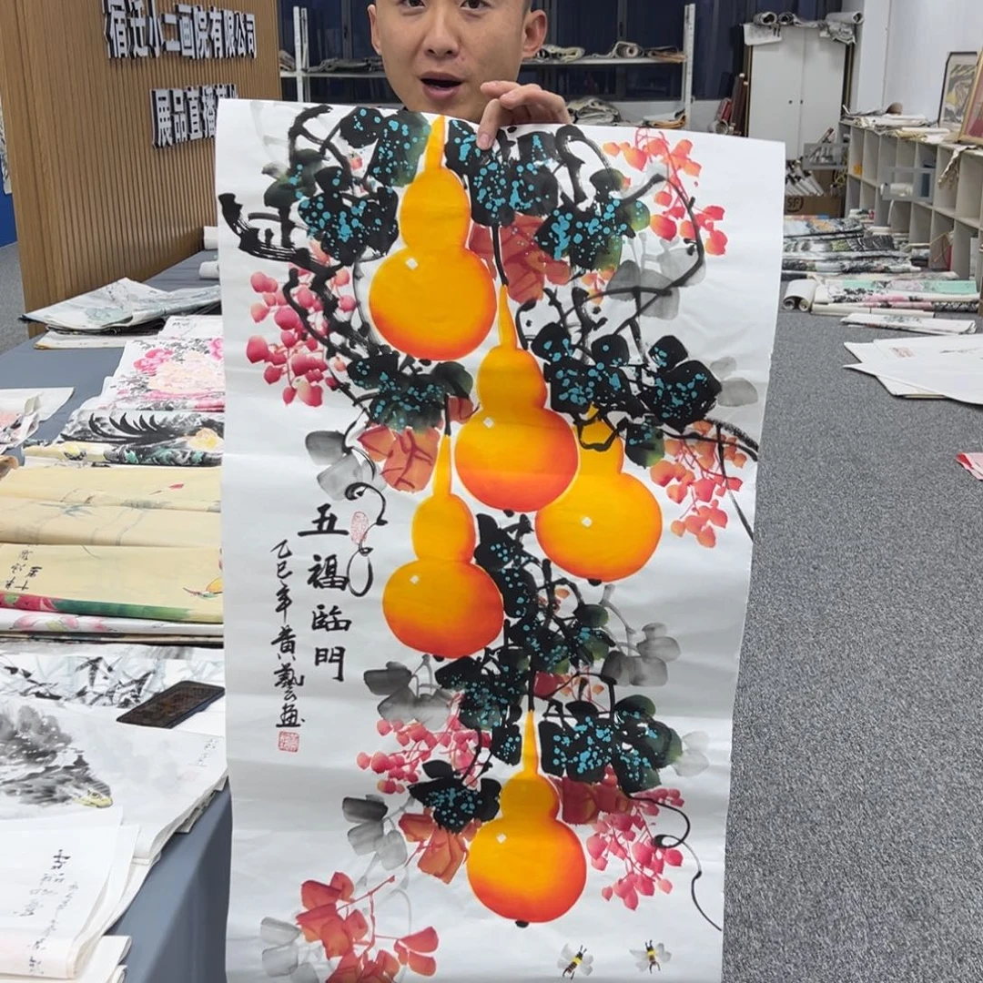 国画卖字画的小男孩