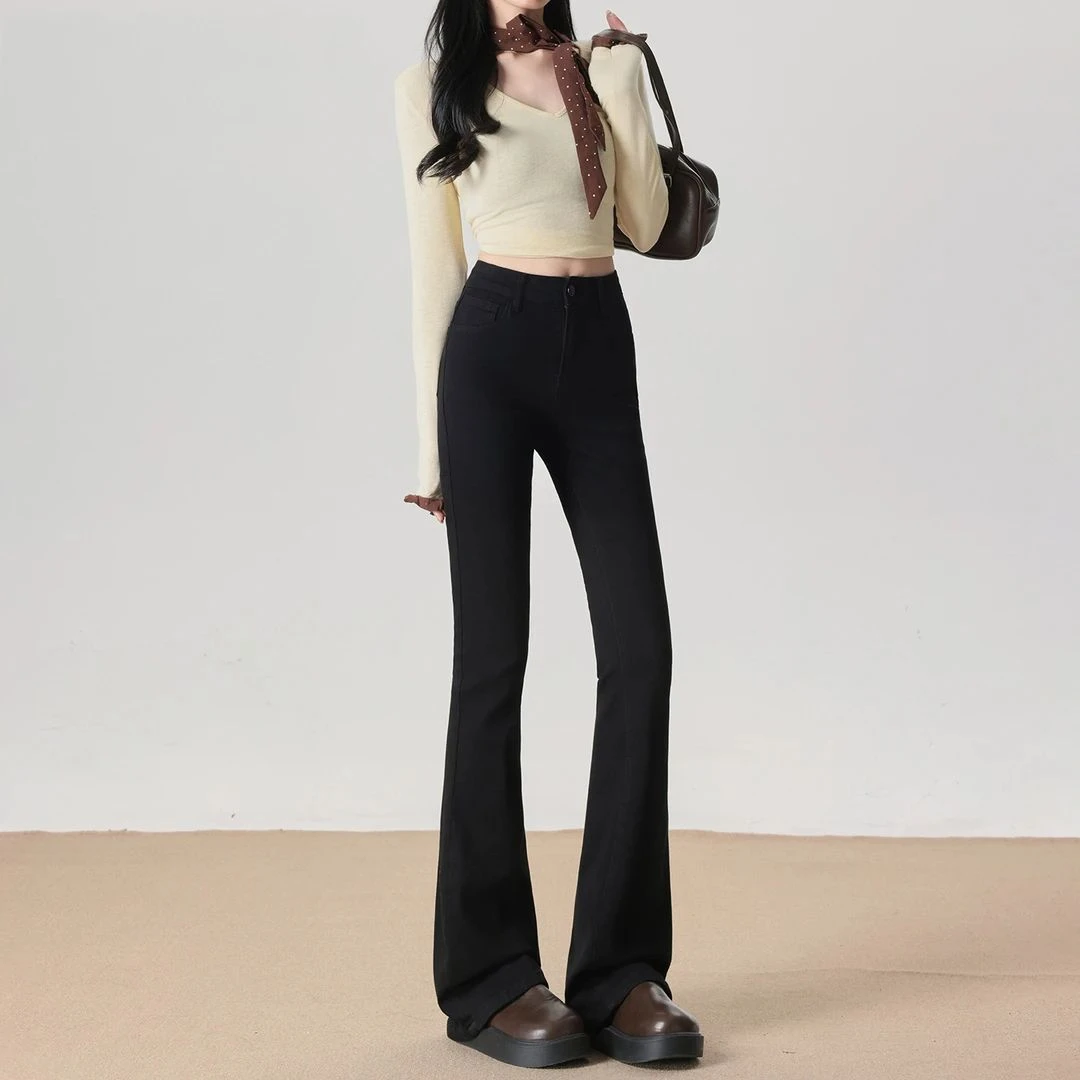 雪千羽黑色加绒加厚微喇牛仔裤女2025新款秋冬高腰修身马蹄喇叭裤