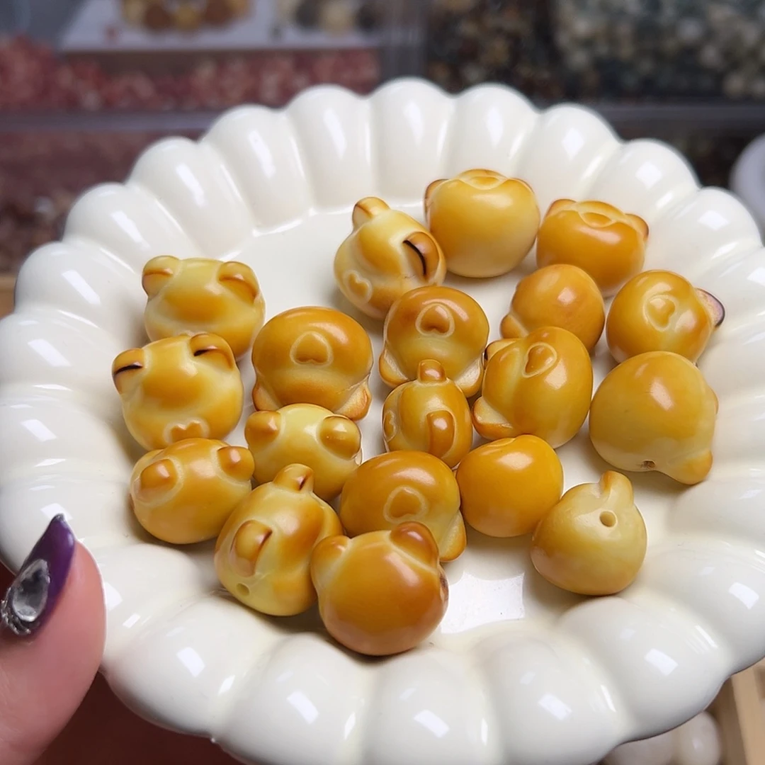 菩提根/象牙果吊坠四颗炭烤熊头孔道表面有裂瑕疵