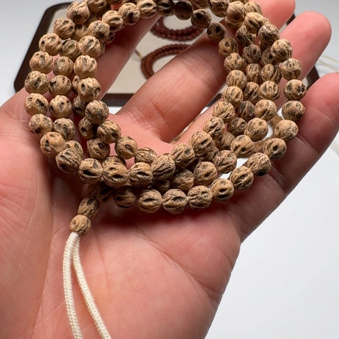 柏香籽/百香籽手串陈*.6.5mm