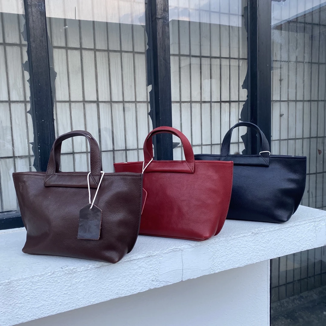 头层植鞣牛皮简约韩版逛街斜挎包饺子包手提单肩斜挎女包61972