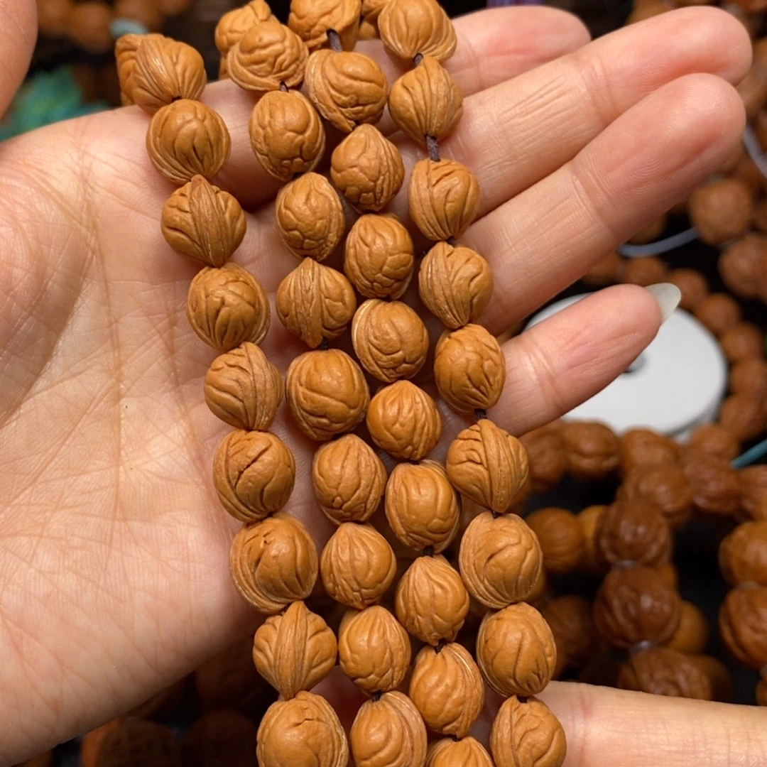 桃核手串小龙纹脖挂