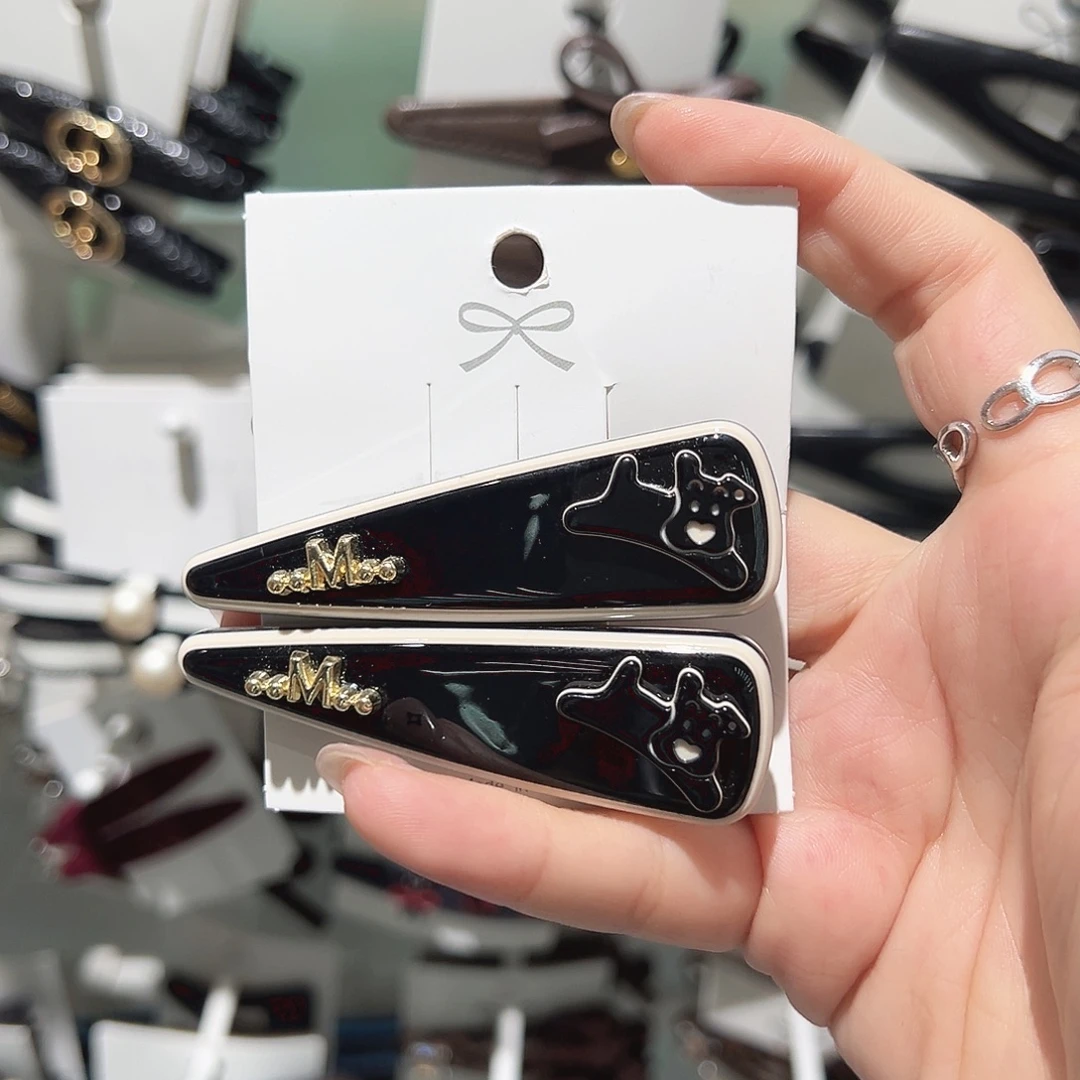 皮质铁合金三角黑色小狗鸭夹