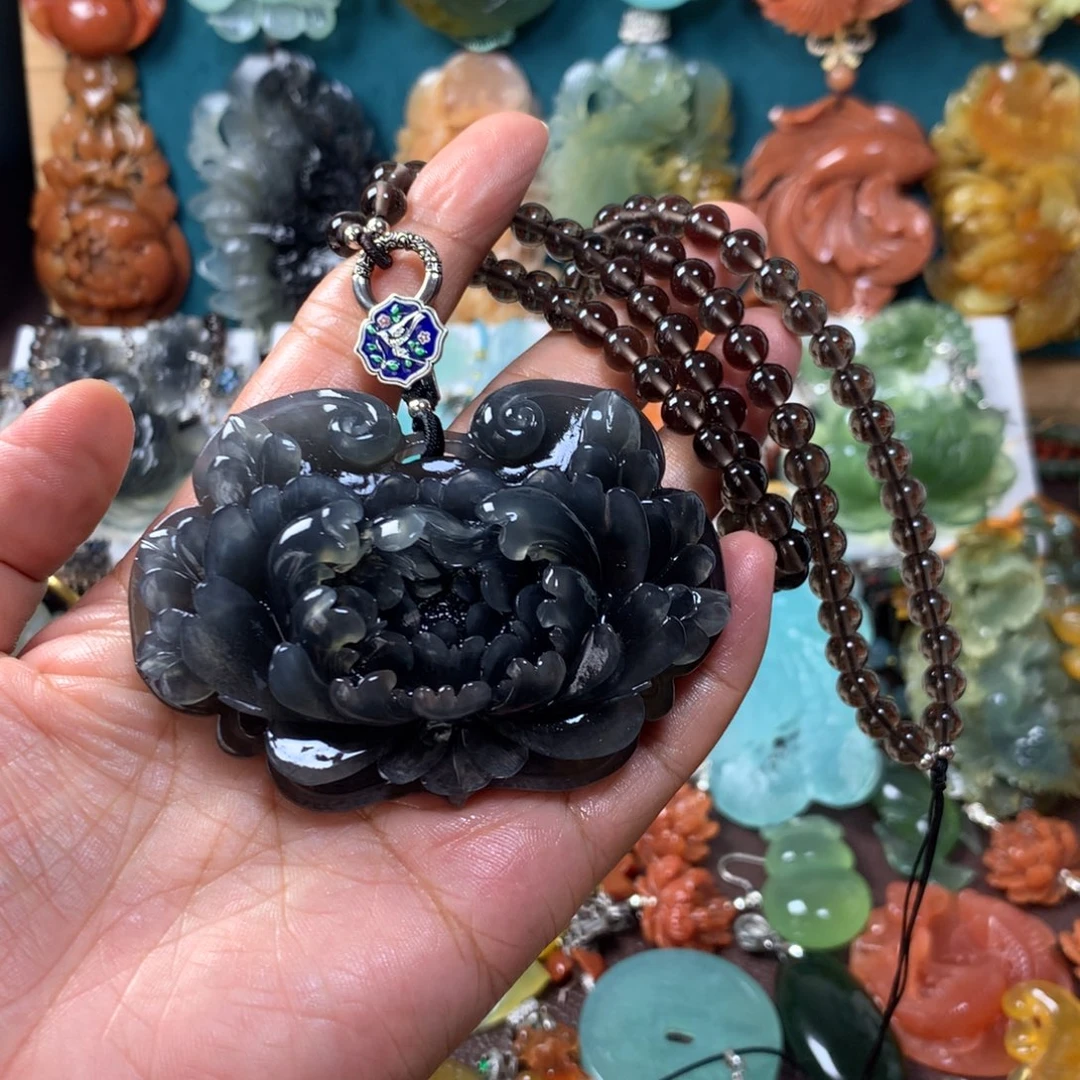 紫***雨未镶嵌蛇纹石玉挂坠