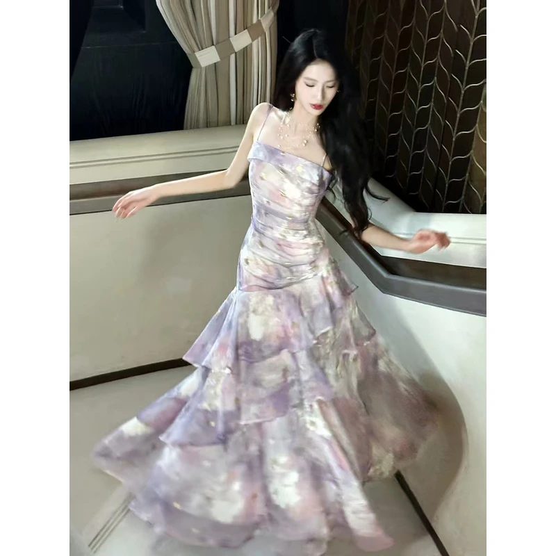 新款紫色印花荷叶边吊带连衣裙法式海边度假不规则鱼尾夏季裙子