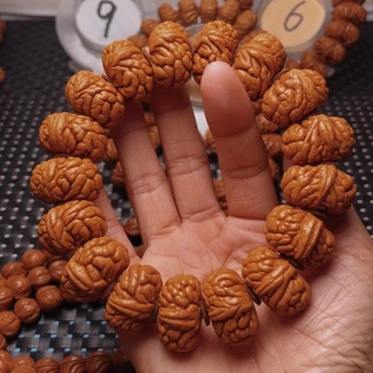 桃核手串知*龙纹桃核