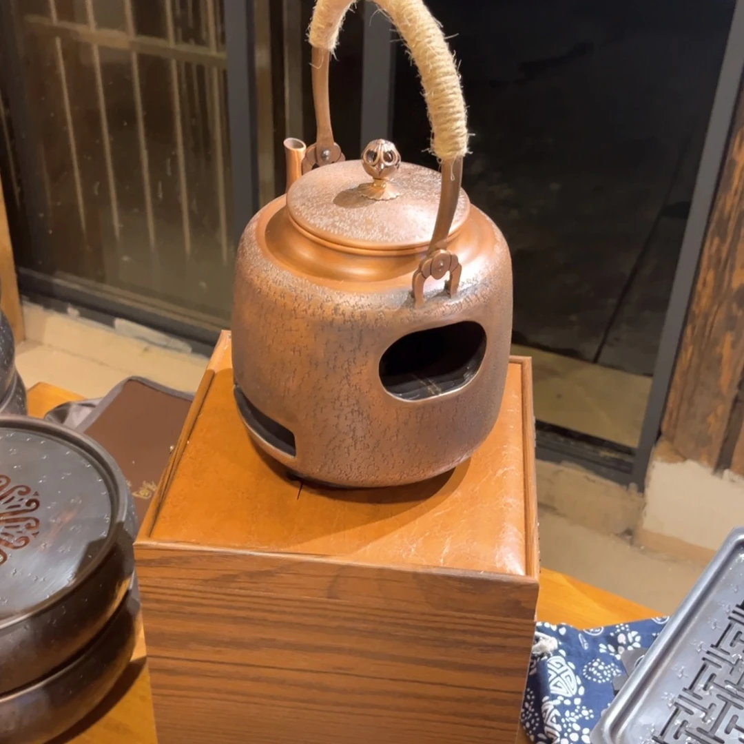 笑**湖炭火一体壶手工锻打工艺