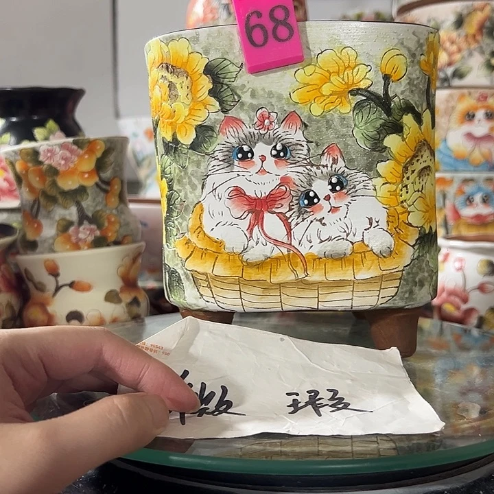沐****景德镇幸运花盆手绘盆