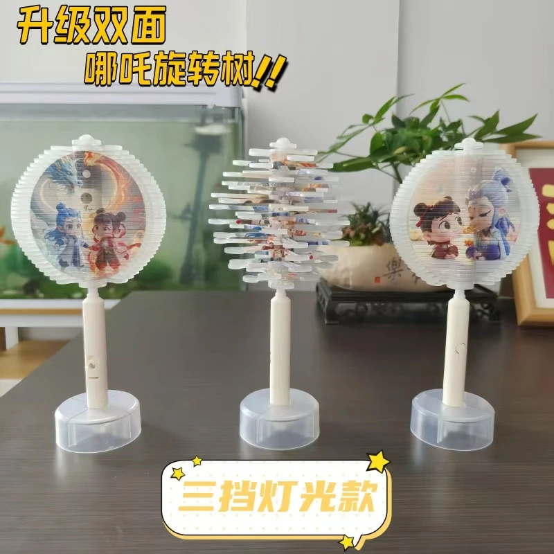 新款哪扎玩具魔童发光旋转棒棒糖双面敖丙夜光变脸解压玩具螺旋树