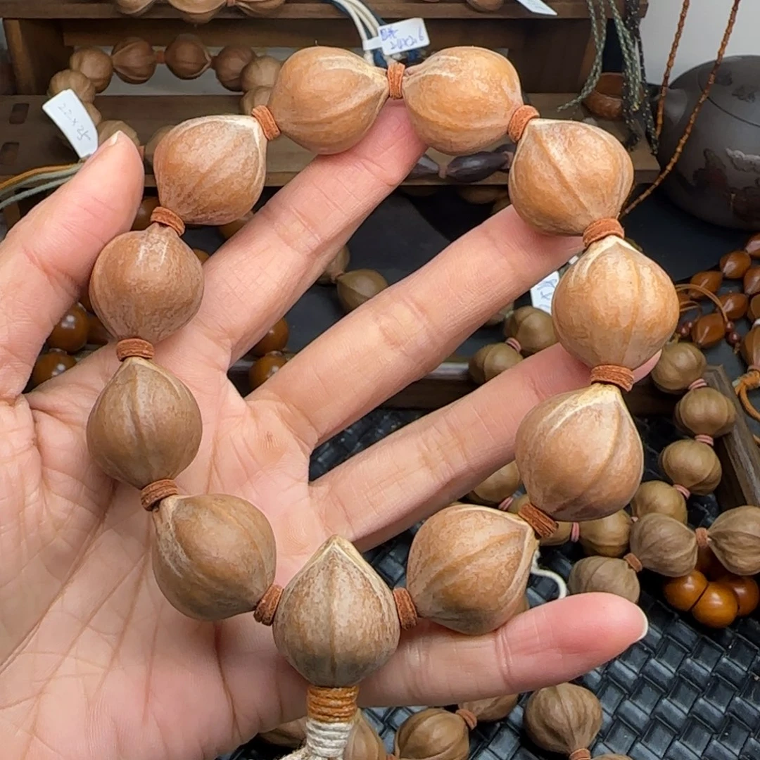 手串橄榄核25。2.0*2.5短圆