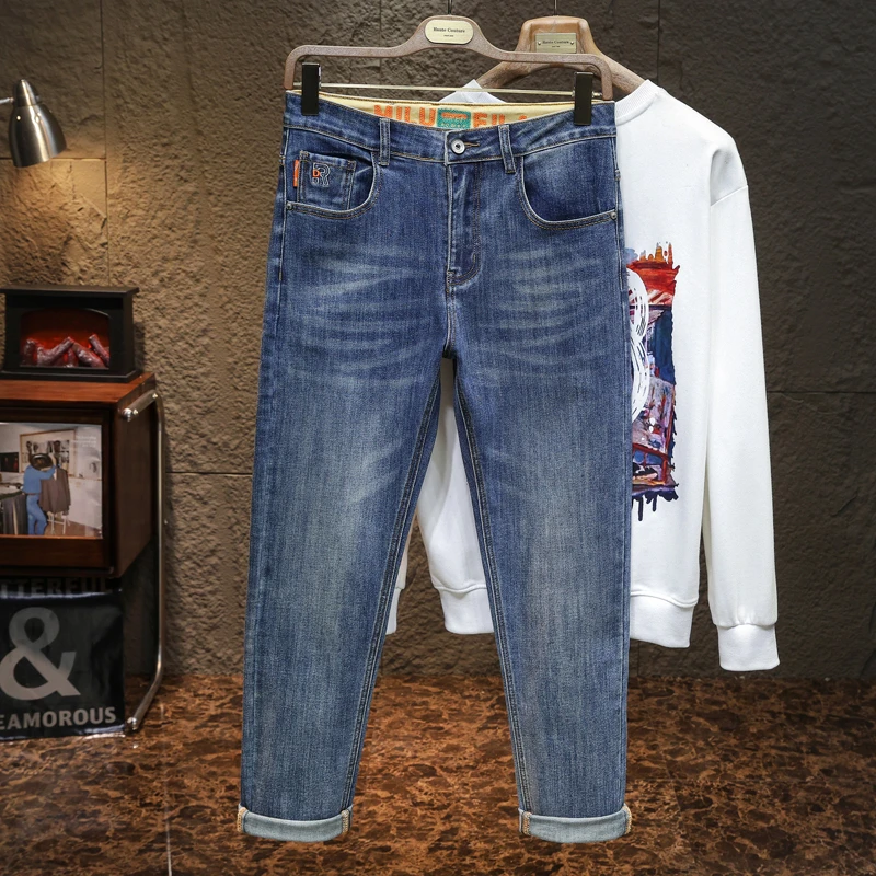 高端新款秋冬季蓝色牛仔裤男士修身韩版百搭裤子锥形小脚弹力长裤