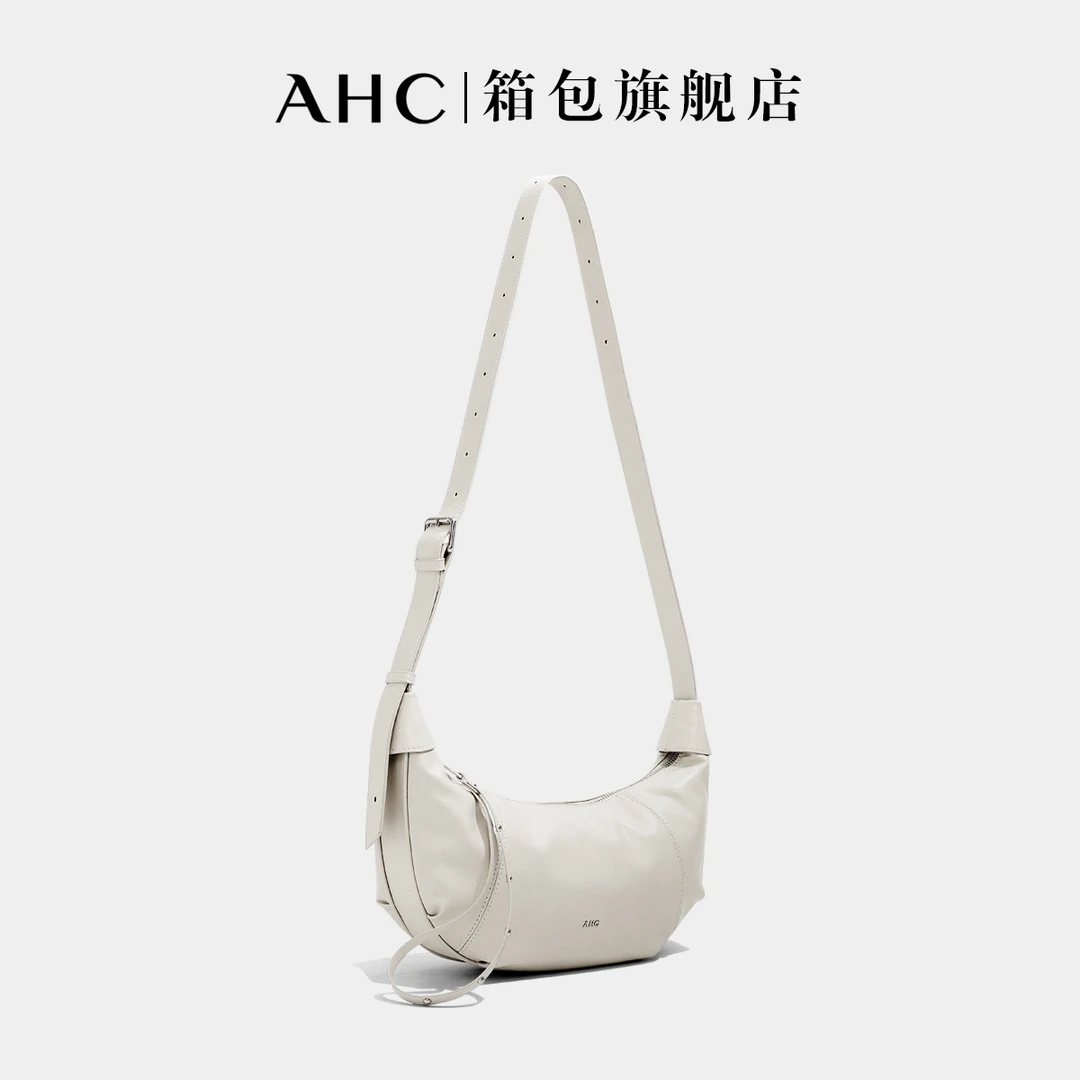 AHC女包2025新款欧若智性风宽肩带牛角包慵懒风通勤单肩包斜挎包