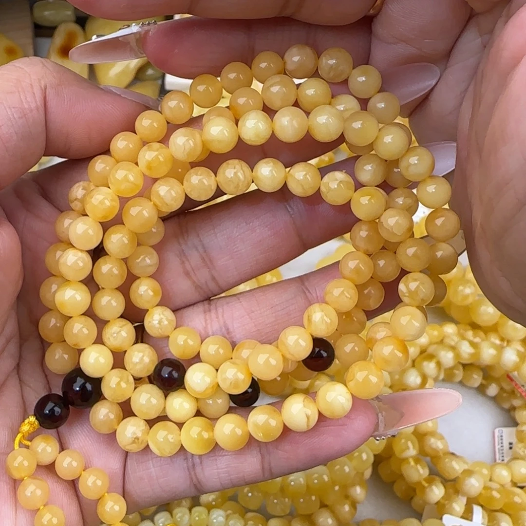 蜜蜡未镶嵌手串鸡油黄佛珠