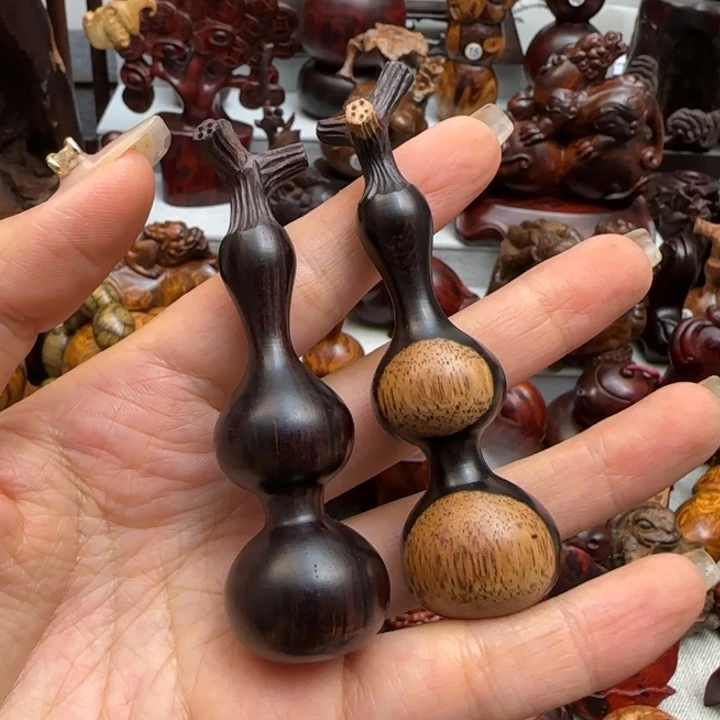 兮***兮木塞州黄檀雕刻龙头葫芦两个